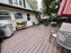 Spacious outdoor deck with an umbrella and furniture, perfect for entertaining guests or relaxing outdoors at 388 N Ohio St, Martinsville, IN 46151