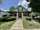Classic home with a welcoming front porch and well-manicured landscaping, offering curb appeal at 388 N Ohio St, Martinsville, IN 46151