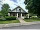 Charming two-story home with a covered front porch, landscaped yard, and inviting curb appeal at 388 N Ohio St, Martinsville, IN 46151