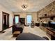 The living room features a stone fireplace, neutral walls, and hardwood trim at 388 N Ohio St, Martinsville, IN 46151