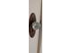 Close up on a vintage glass doorknob and metal plate, adding character and charm to the home at 414 E Main St, Plainfield, IN 46168