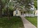 Charming single Gathering home with covered front porch, stairway, and a sidewalk at 414 E Main St, Plainfield, IN 46168