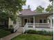 Charming single Gathering home with front porch and stairway at 414 E Main St, Plainfield, IN 46168