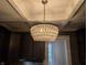 Stylish kitchen with decorative lighting, granite countertops, and dark cabinetry at 414 E Main St, Plainfield, IN 46168