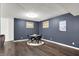 Finished basement featuring a dining table set and dark-colored accent wall at 4279 Redwood Ct, Zionsville, IN 46077