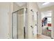 Bathroom with a glass-enclosed shower and a separate water closet at 4279 Redwood Ct, Zionsville, IN 46077