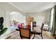 Comfortable dining area with hardwood floors, neutral paint, and open layout to the next room at 4279 Redwood Ct, Zionsville, IN 46077