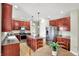 Kitchen with stainless steel appliances, a center island, and ample cabinetry at 4279 Redwood Ct, Zionsville, IN 46077