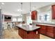 Well-lit kitchen featuring a center island and seamless flow to the living room at 4279 Redwood Ct, Zionsville, IN 46077