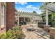 Outdoor patio with pergola, seating, and hot tub creates an inviting space for relaxation and entertainment at 4279 Redwood Ct, Zionsville, IN 46077