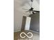 Bright bedroom features neutral walls, a ceiling fan, and white trim on the door at 459 Dekalb Dr, Westfield, IN 46074