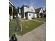 A quaint two-story home with a well-kept lawn and charming curb appeal at 46 S Warman S Ave, Indianapolis, IN 46222