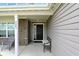 Inviting front porch featuring comfortable seating, stylish decor, and a welcoming entrance to the home at 4643 Darla Ct, Indianapolis, IN 46239