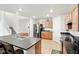 Spacious kitchen features stainless steel appliances and a large island with a double sink at 4643 Darla Ct, Indianapolis, IN 46239