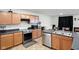 Kitchen features stainless steel appliances, modern countertops, cabinets, and an eat in area at 4643 Darla Ct, Indianapolis, IN 46239
