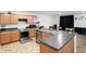 Well-equipped kitchen features stainless appliances, modern countertops, and ample cabinetry at 4643 Darla Ct, Indianapolis, IN 46239