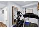 Basement gym featuring exercise equipment, and a full length mirror to enhance your workout experience at 564 Gainesway N Dr, Greenwood, IN 46142