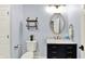 Stylish bathroom with a marble countertop, gold fixtures, and decorative mirror that enhances the bright space at 564 Gainesway N Dr, Greenwood, IN 46142