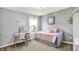 Charming bedroom featuring a trundle bed, stylish decor, and soft colors at 564 Gainesway N Dr, Greenwood, IN 46142