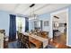 Dining room with natural light, hardwood floors, and comfortable seating at 564 Gainesway N Dr, Greenwood, IN 46142