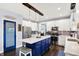 Bright kitchen features a center island, stainless steel appliances, and open layout at 564 Gainesway N Dr, Greenwood, IN 46142