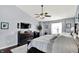 Comfortable main bedroom with a ceiling fan, dresser, and a window offering natural light at 564 Gainesway N Dr, Greenwood, IN 46142