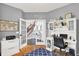 Well-lit home office with hardwood floors and access to foyer at 564 Gainesway N Dr, Greenwood, IN 46142