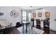 Spacious playroom offers a round table with chairs, large clock, and desks for doing homework at 564 Gainesway N Dr, Greenwood, IN 46142