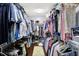 Spacious walk-in closet with ample storage and hardwood floors at 564 Gainesway N Dr, Greenwood, IN 46142