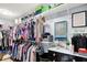 Well-organized walk-in closet featuring shelving, clothing rods, and a stylish display at 564 Gainesway N Dr, Greenwood, IN 46142