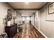 Spacious hallway with charming decor, leading to various rooms in the home at 5736 Primrose Ave, Indianapolis, IN 46220