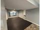 Finished basement offering durable rubber flooring and a large mirror for a workout area at 5775 Coopers Hawk Dr, Carmel, IN 46033