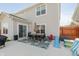 Spacious backyard patio with an outdoor dining set and play equipment, perfect for gatherings at 5809 Terracotta Trce, McCordsville, IN 46055