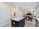 View of living space from kitchen shows open floor plan with eating area and living area at 5809 Terracotta Trce, McCordsville, IN 46055