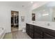 Elegant main bathroom with dual sink vanity, and access to walk-in closet at 5809 Terracotta Trce, McCordsville, IN 46055