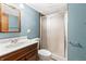 Bathroom with blue walls, shower stall, and vanity with sink at 604 Oak Blvd W Dr, Greenfield, IN 46140