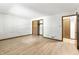 Neutral-toned bedroom with closet and attached bathroom door at 604 Oak Blvd W Dr, Greenfield, IN 46140