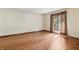 Empty bedroom with hardwood floors, a window, and neutral walls at 604 Oak Blvd W Dr, Greenfield, IN 46140