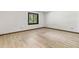 Bright bedroom featuring a large window and neutral decor at 604 Oak Blvd W Dr, Greenfield, IN 46140