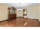 Dining room featuring hardwood floors and a hutch, open to the kitchen at 604 Oak Blvd W Dr, Greenfield, IN 46140