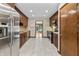 Spacious kitchen with stainless steel appliances, granite countertops, and tiled floors at 604 Oak Blvd W Dr, Greenfield, IN 46140