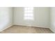 Cozy bedroom with neutral walls and plush carpeting, offering a tranquil retreat at 609 Willow Dr, Shelbyville, IN 46176