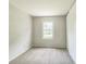 Calm bedroom with neutral tones, carpet, and closet offering a peaceful atmosphere at 609 Willow Dr, Shelbyville, IN 46176