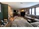 Inviting living room with fireplace, TV, modern floors, and comfortable seating at 6161 E Runnymede Ct, Camby, IN 46113
