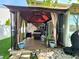 Relaxing outdoor patio with a comfortable seating area, perfect for enjoying the beautiful weather at 6161 E Runnymede Ct, Camby, IN 46113