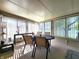 Bright sun room featuring plenty of natural light, table and chairs, perfect for relaxing or entertaining guests at 6161 E Runnymede Ct, Camby, IN 46113