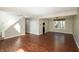 Spacious living area showcasing hardwood floors, natural light, and a view of the staircase at 6465 Robinsrock Dr, Indianapolis, IN 46268