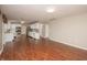 Open concept living area with wood flooring connecting the kitchen at 6465 Robinsrock Dr, Indianapolis, IN 46268