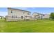 Large backyard featuring a deck area perfect for relaxation and outdoor gatherings at 7350 Gold King Way, Indianapolis, IN 46259