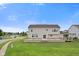 Spacious backyard featuring a large deck and gazebo, perfect for outdoor living and entertaining at 7350 Gold King Way, Indianapolis, IN 46259